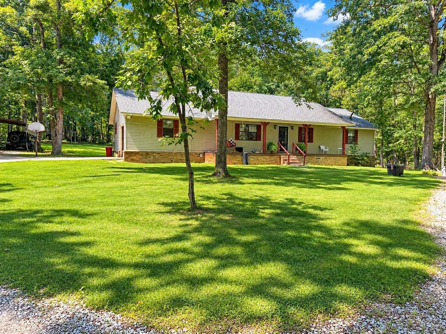 22.8 Acres of Recreational Land with Home for Sale in Savannah, Tennessee