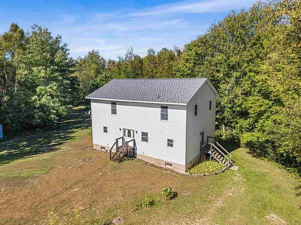 50 Acres of Recreational Land with Home for Sale in Carp Lake, Michigan