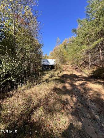 9 Acres of Land with Home for Sale in Hampton, Tennessee