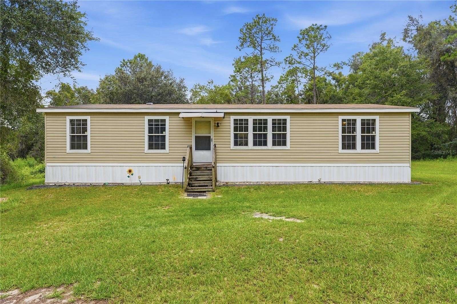 2.14 Acres of Land with Home for Sale in Lake Butler, Florida