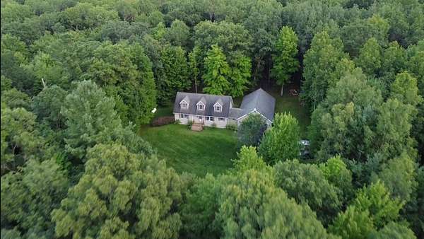 10 Acres of Recreational Land with Home for Sale in Montague, Michigan