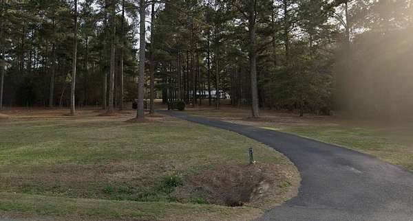 31.3 Acres of Land with Home for Sale in Adel, Georgia