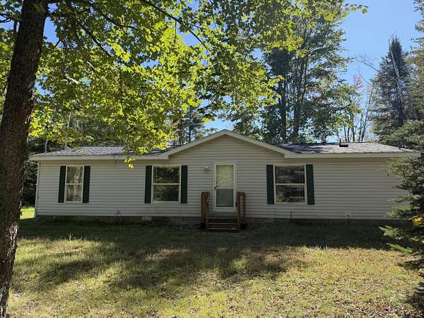 10 Acres of Recreational Land with Home for Sale in Vanderbilt, Michigan