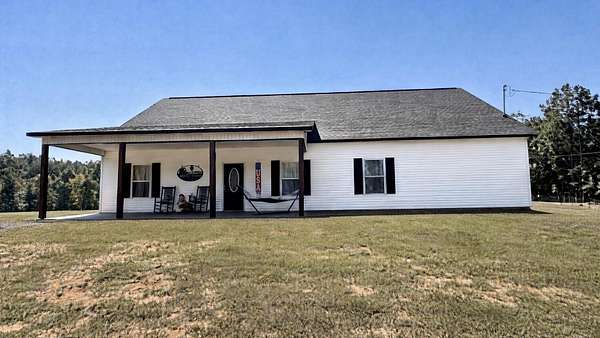 16.4 Acres of Land with Home for Sale in Blue Springs, Mississippi
