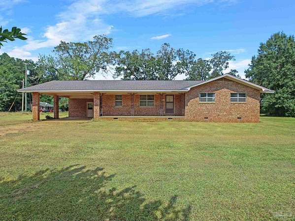 2.68 Acres of Land with Home for Sale in Jay, Florida