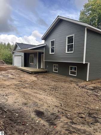 2.5 Acres of Land with Home for Sale in Interlochen, Michigan