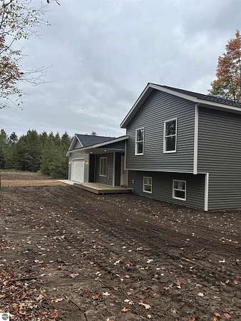 2.5 Acres of Land with Home for Sale in Interlochen, Michigan