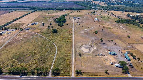 16.3 Acres of Land with Home for Sale in Whitewright, Texas