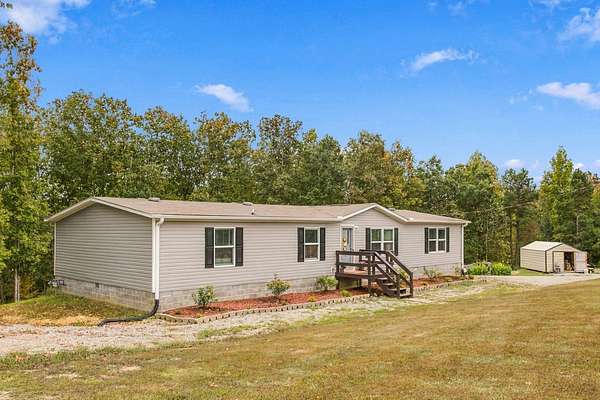 11.3 Acres of Land with Home for Sale in Hohenwald, Tennessee
