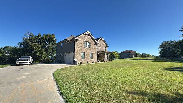 1.53 Acres of Land with Home for Sale in Cunningham, Tennessee