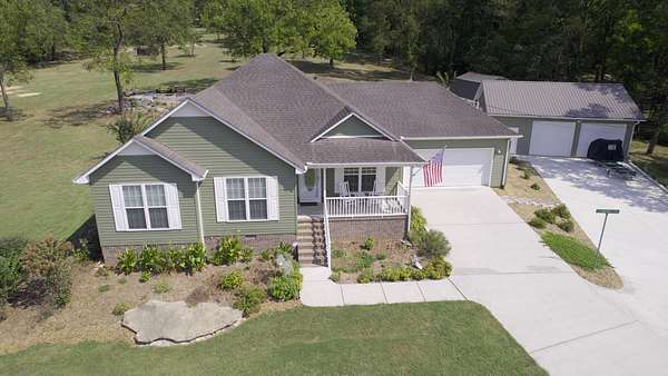 5.54 Acres of Land with Home for Sale in Mulberry, Tennessee