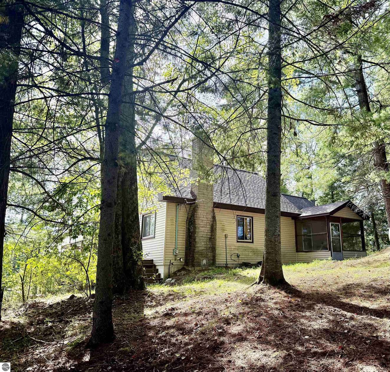 10 Acres of Recreational Land with Home for Sale in Falmouth, Michigan