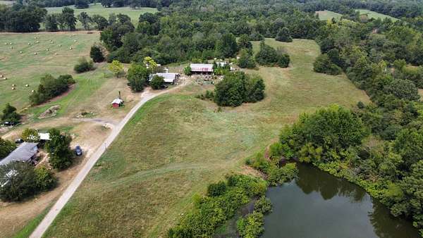 59 Acres of Recreational Land with Home for Auction in Hartman, Arkansas