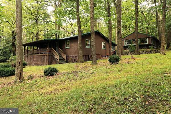 2 Acres of Land with Home for Sale in Snow Shoe, Pennsylvania