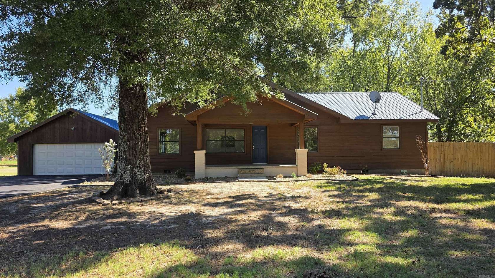 11.2 Acres of Land with Home for Sale in Atkins, Arkansas