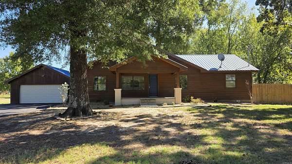 11.2 Acres of Land with Home for Sale in Atkins, Arkansas