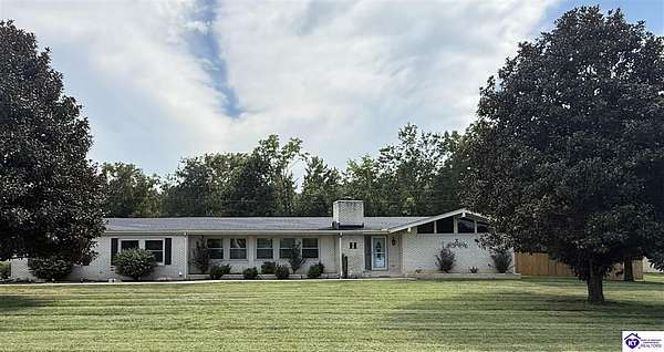1.5 Acres of Land with Home for Auction in Irvington, Kentucky