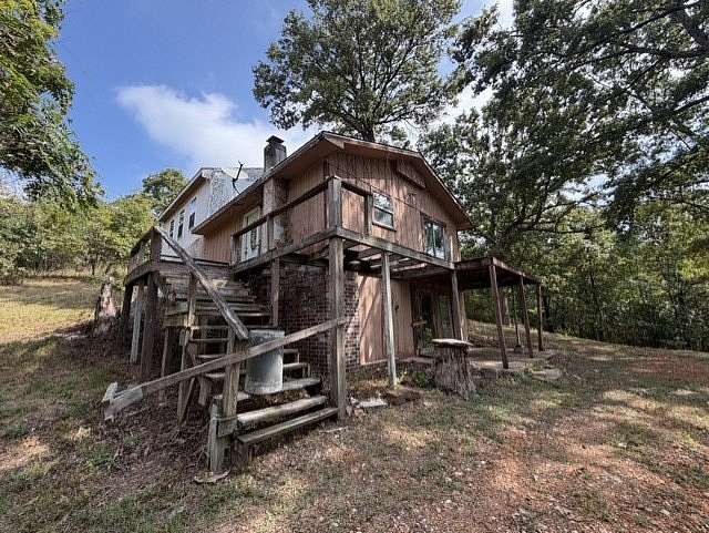 4.76 Acres of Land with Home for Sale in Garfield, Arkansas