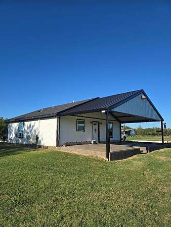 48 Acres of Agricultural Land with Home for Sale in Covington, Texas