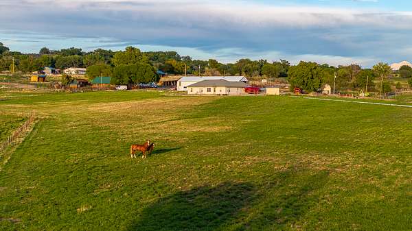 30.9 Acres of Land with Home for Sale in Hotchkiss, Colorado