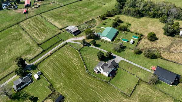 31.6 Acres of Land with Home for Sale in Versailles, Kentucky