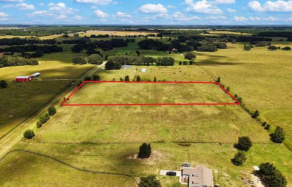 4.58 Acres of Land with Home for Sale in Morriston, Florida