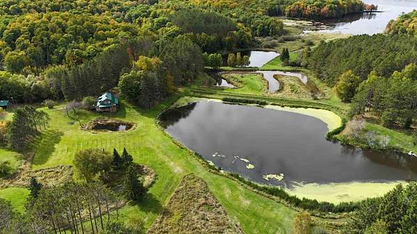 76.7 Acres of Land with Home for Sale in Westboro, Wisconsin