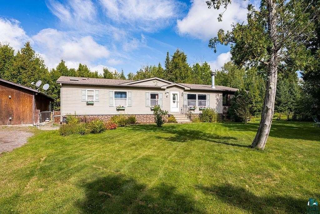 7.48 Acres of Land with Home for Sale in Saginaw, Minnesota