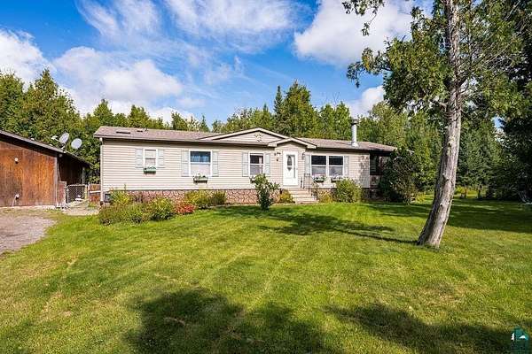 7.48 Acres of Land with Home for Sale in Saginaw, Minnesota