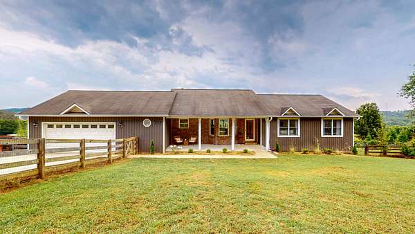 5.52 Acres of Land with Home for Sale in Riceville, Tennessee
