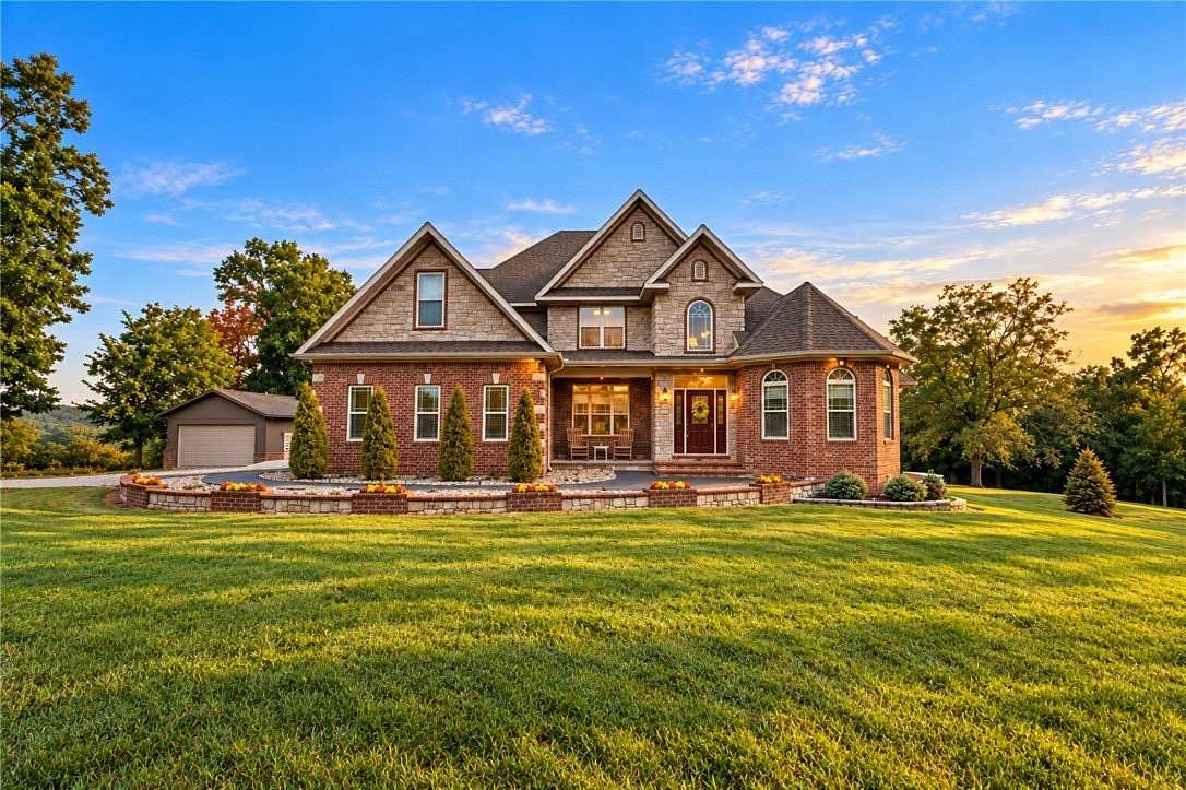 5.45 Acres of Land with Home for Sale in Gravette, Arkansas