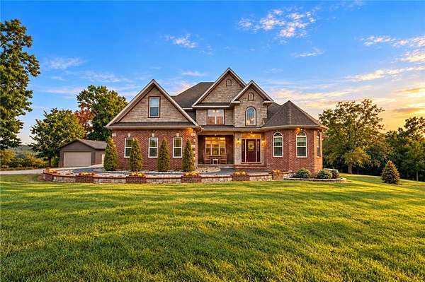 5.45 Acres of Land with Home for Sale in Gravette, Arkansas