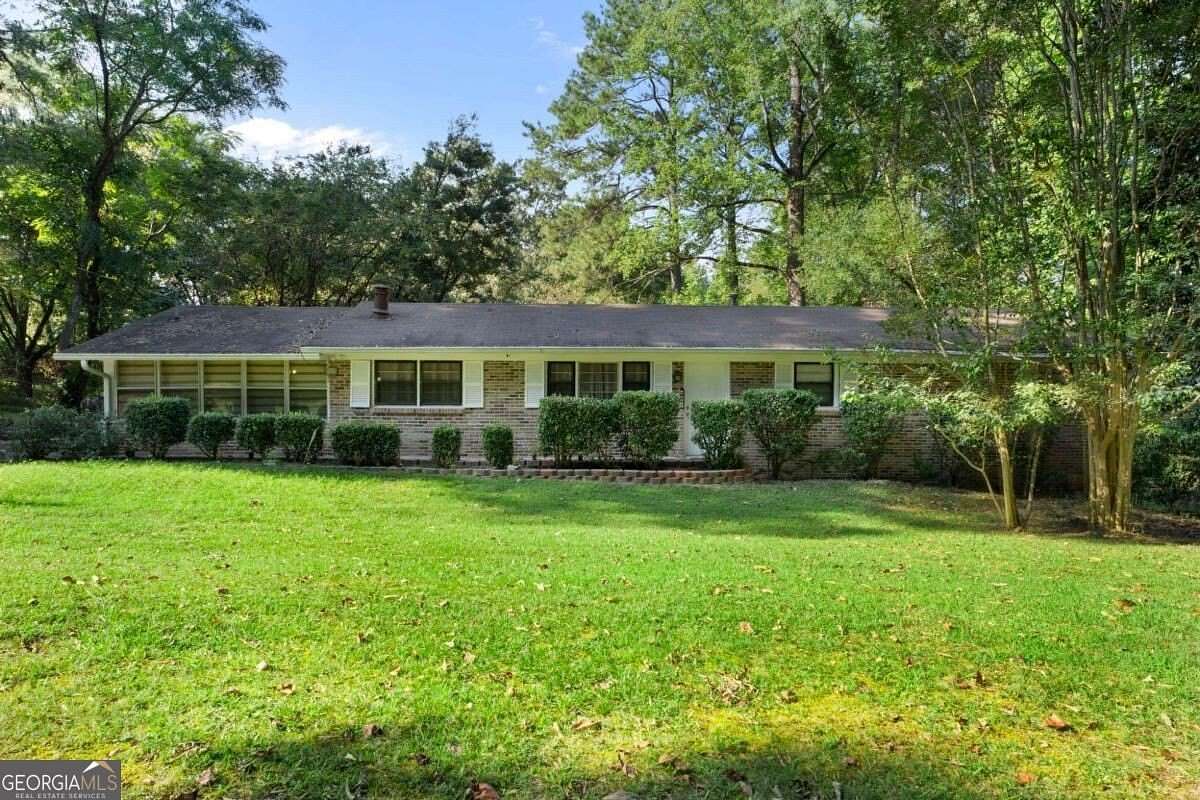 2.83 Acres of Land with Home for Sale in Lithonia, Georgia