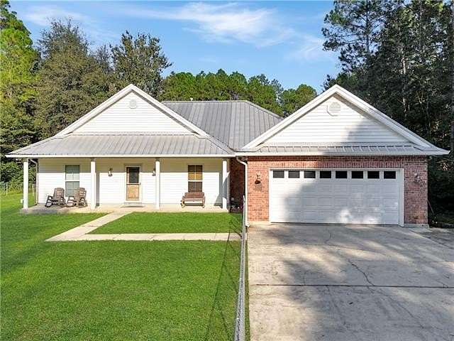 2.69 Acres of Land with Home for Sale in Slidell, Louisiana