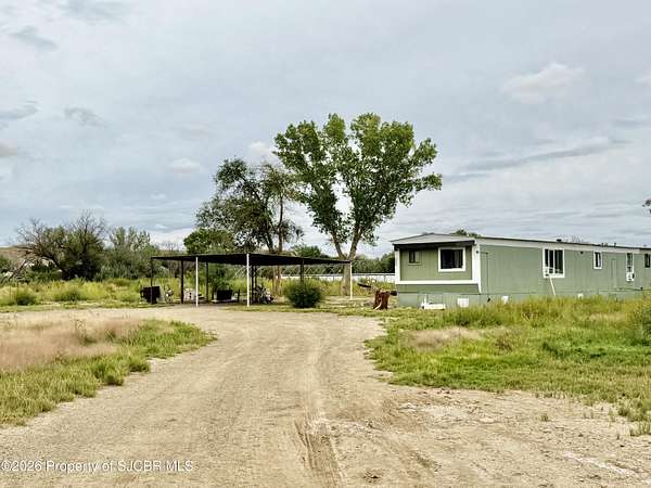 3 Acres of Land with Home for Sale in Waterflow, New Mexico