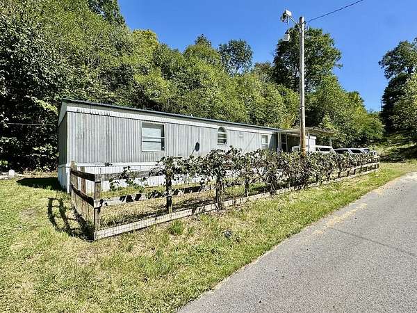 13.6 Acres of Land with Home for Sale in Lucasville, Ohio