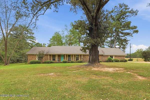 9.8 Acres of Land with Home for Sale in Canton, Mississippi
