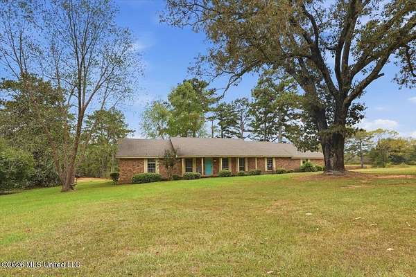 9.8 Acres of Land with Home for Sale in Canton, Mississippi