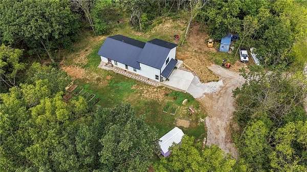 7.4 Acres of Land with Home for Sale in Odessa, Missouri