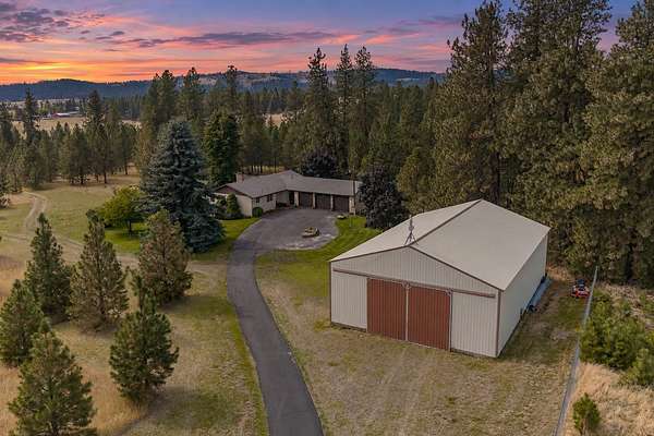 17 Acres of Land with Home for Sale in Colbert, Washington