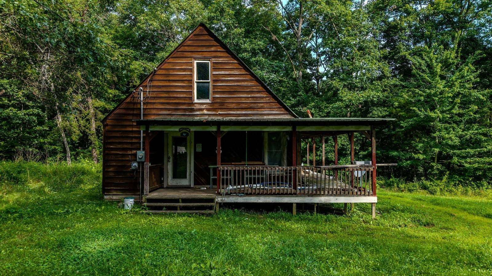 5.1 Acres of Land with Home for Sale in Deer Lodge, Tennessee