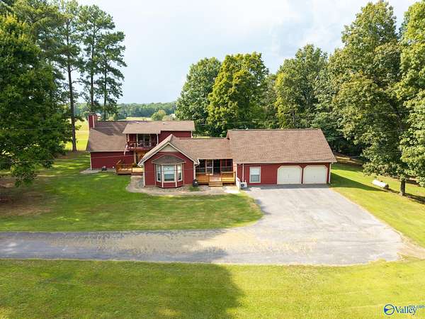 6.8 Acres of Land with Home for Sale in Laceys Spring, Alabama