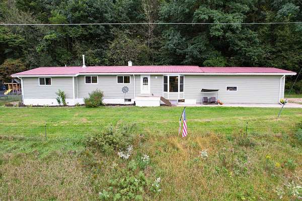 10.2 Acres of Recreational Land with Home for Sale in Blue River, Wisconsin