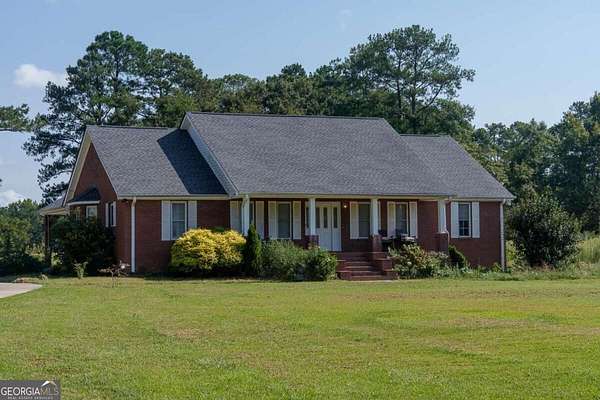 35.3 Acres of Land with Home for Sale in Hampton, Georgia