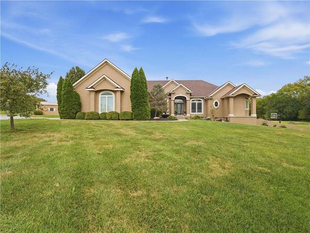 5.75 Acres of Land with Home for Sale in Peculiar, Missouri