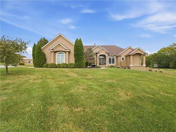 5.75 Acres of Land with Home for Sale in Peculiar, Missouri