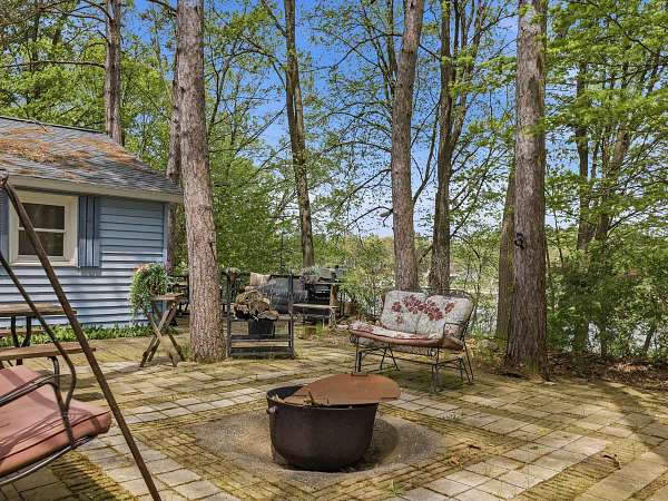 0.88 Acres of Land with Home for Sale in Stanwood, Michigan