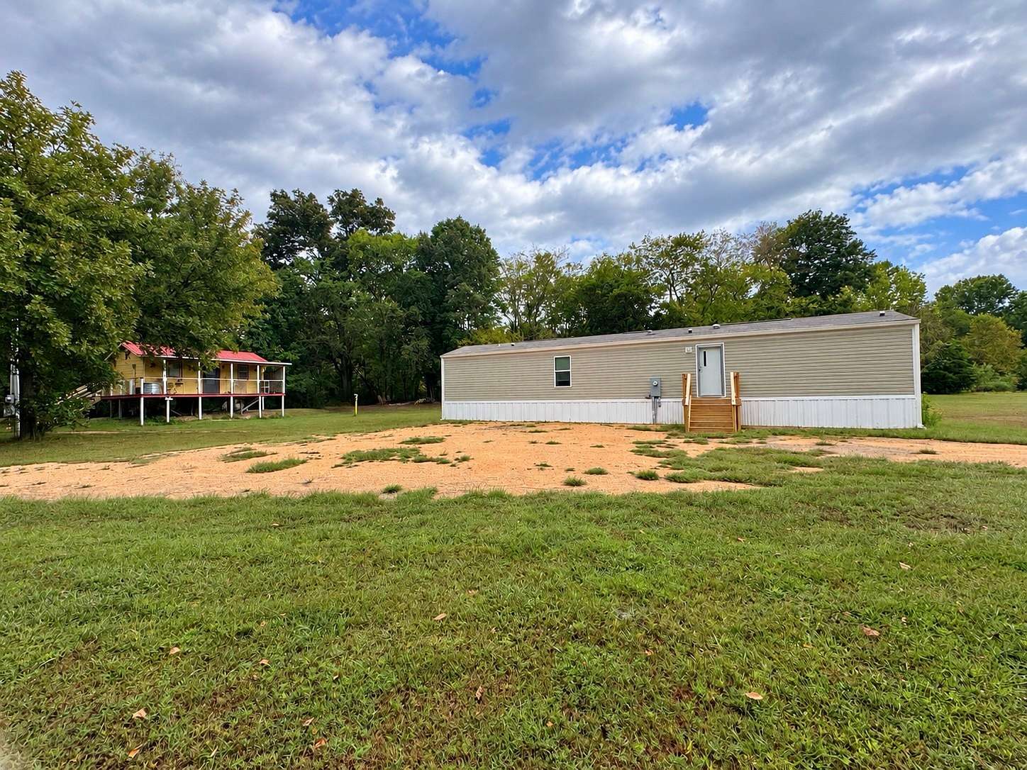 3.1 Acres of Land with Home for Sale in Linden, Tennessee