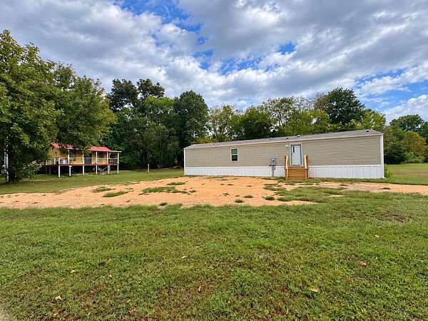 3.1 Acres of Land with Home for Sale in Linden, Tennessee