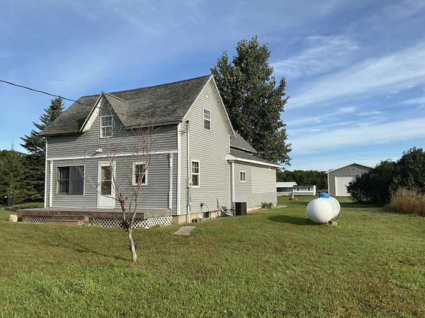9 Acres of Land with Home for Sale in Kalkaska, Michigan